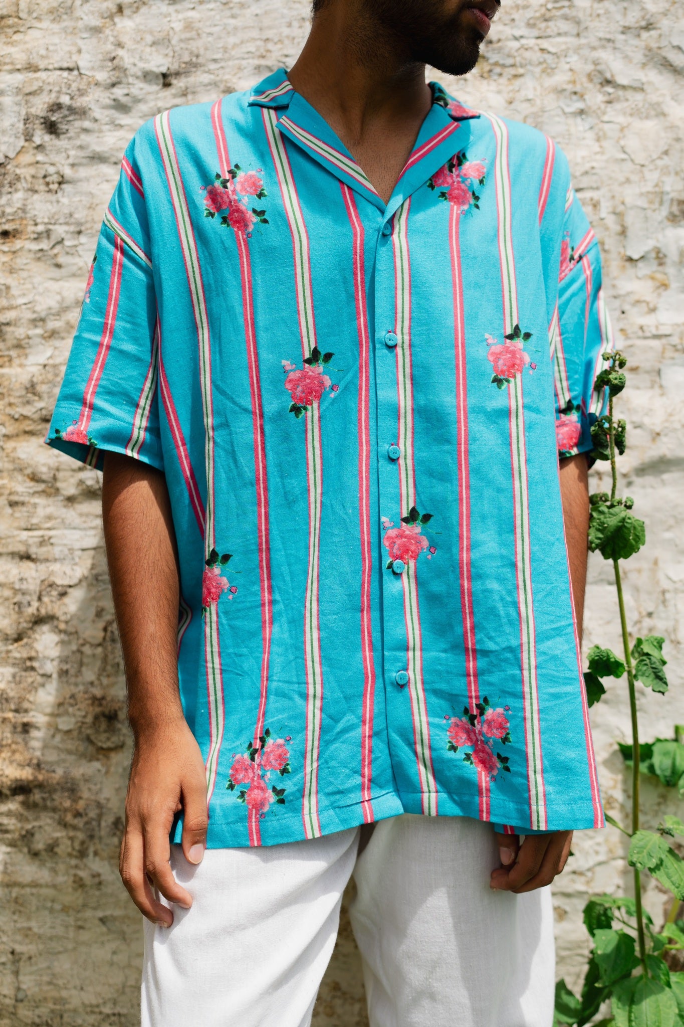 TREEJM's "Rangeela" Cuban Shirt combines hand-woven cotton quality with a relaxed striped design and Cuban collar, ensuring comfort and a trendy look.